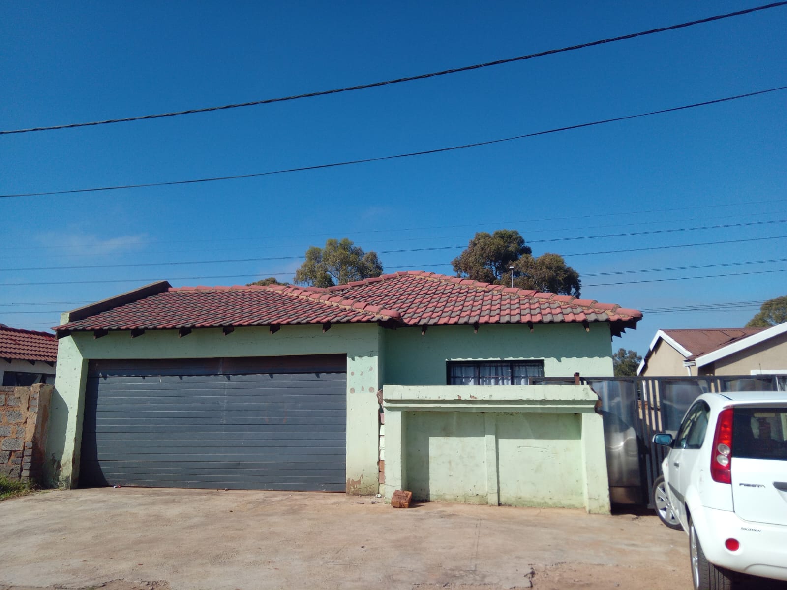 Property exterior with secure garage